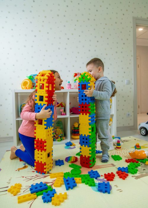children-playing-with-toys-in-the-room-selective-2025-03-15-19-39-14-utc